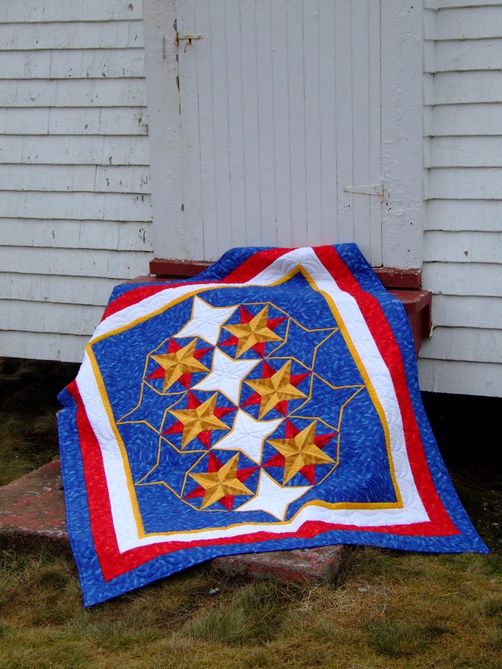 Encompassing quilt pattern